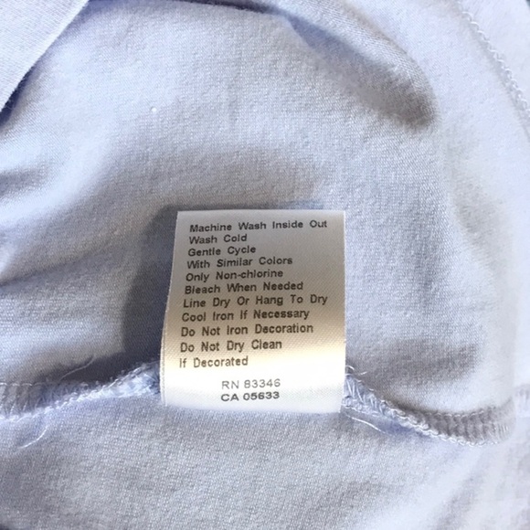 “Z” Sleeveless Ruffle Neck Blouse - Picture 4 of 6